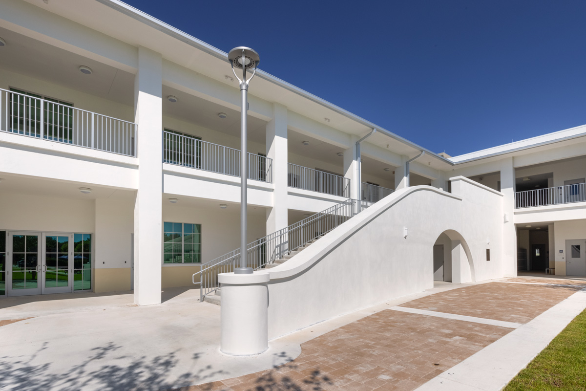 Architectural dusk photo of outdoor stairs at Palmer Trinity student center in Miami, FL